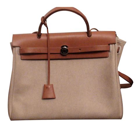 sac hermes en toile|pochette hermes femme.